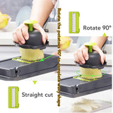 Kitchen vegetable cutter with multiple blades for slicing and grating.