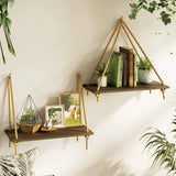 Black hanging shelves with woven hanger, perfect for boho wall decor in bedrooms and living rooms.