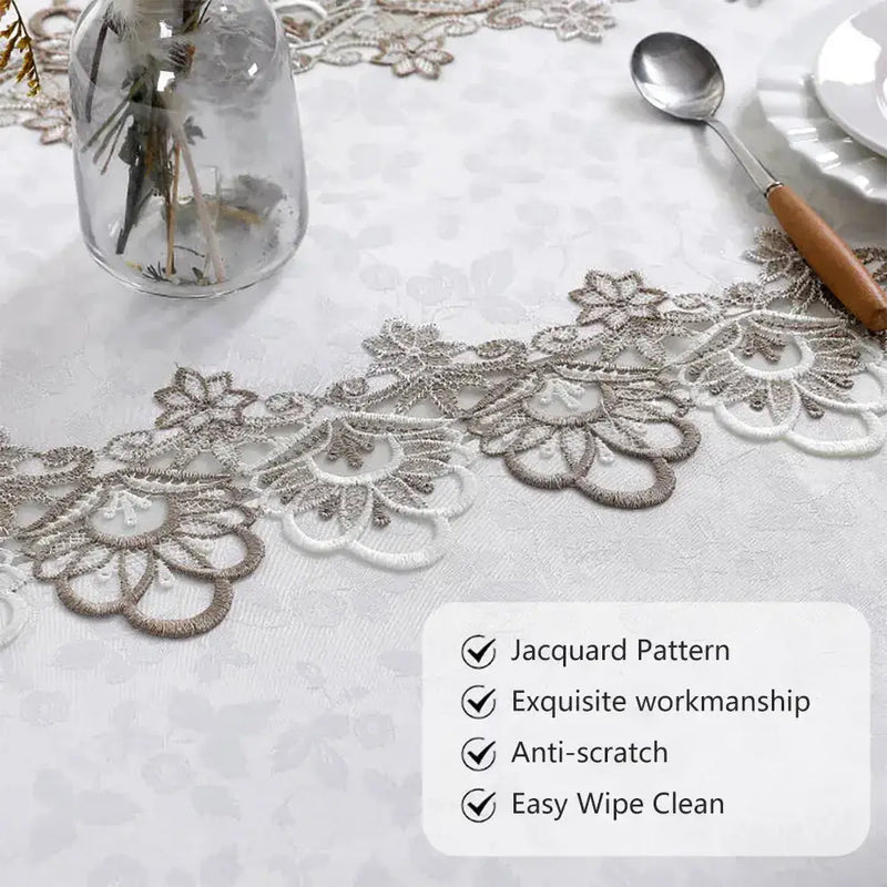 Close-up of Battilo lace embroidery tablecloth showcasing jacquard pattern, exquisite workmanship, anti-scratch, and easy wipe-clean features.