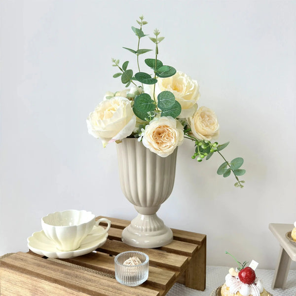 Decorative flower arrangement pot with a classic retro color design for stylish interiors.