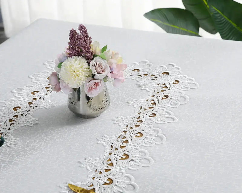 Close-up of Battilo lace embroidery tablecloth showcasing jacquard pattern, exquisite workmanship, anti-scratch, and easy wipe-clean features.