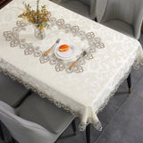 Battilo lace embroidery tablecloth with floral design on a dining table. Waterproof and elegant, perfect for weddings, parties, and home decor.